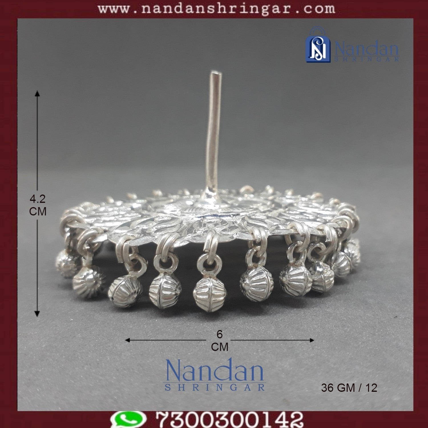 Fine silver Designer Chakri by Utsav Arts, featuring intricate detailing and a traditional design in an elegant display.