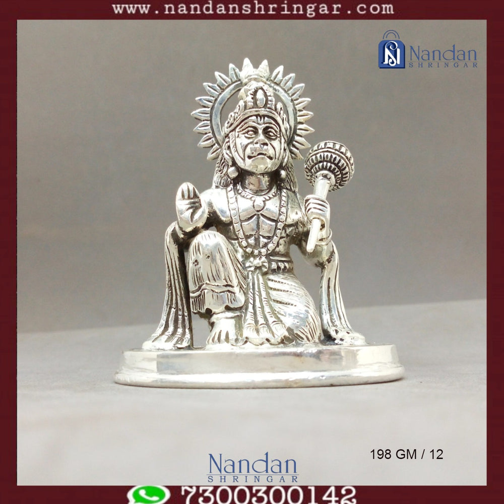 Fine silver statue of Hanuman Ji by Utsav Arts, showcasing intricate details and craftsmanship in a serene pose.