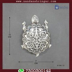 Fine silver tortoise sculpture by Utsav Arts, detailed craftsmanship with a smooth, polished finish and intricate shell design.