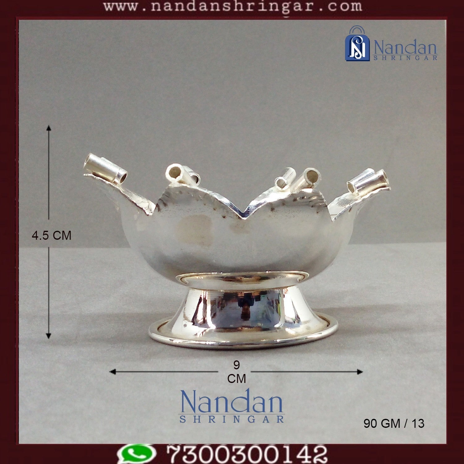 Fine silver Kamal Aarti by Utsav Arts, showcasing intricate detailing and traditional design elements.