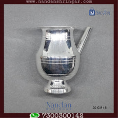 Fine silver jewelry from Utsav Arts featuring intricate design and craftsmanship, showcased in a beautifully lit image.