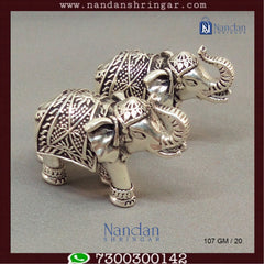 Antique fine silver elephant figurines from Utsav Arts, showcasing intricate details and craftsmanship.