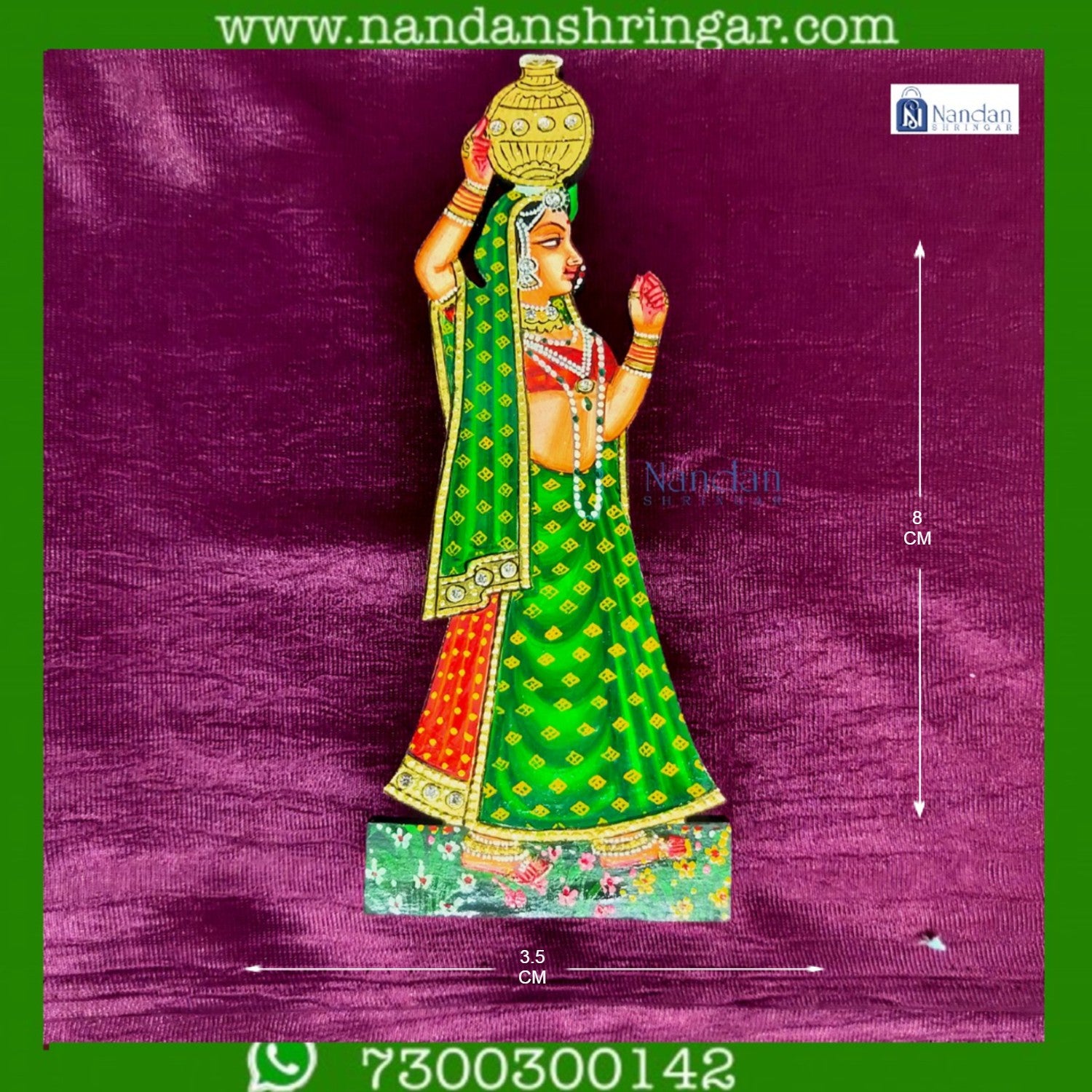 Green Gopi Matki pair by nandanshringars, featuring traditional design and craftsmanship, displayed on a neutral background.