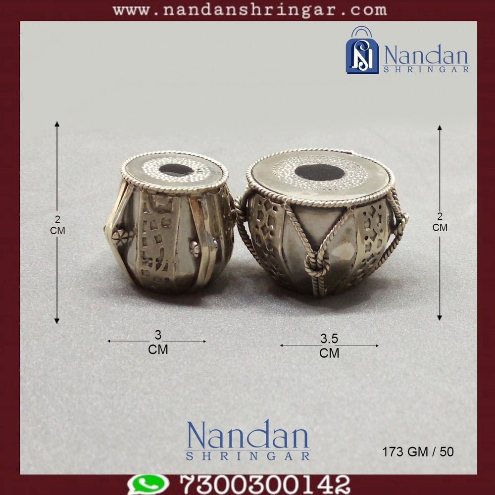 Fine silver musical set by Utsav Arts featuring intricate design and craftsmanship, displayed against a neutral background.